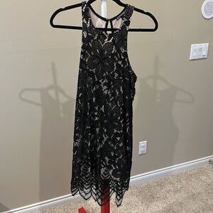 EUC Express Medium black lace dress with nude lining